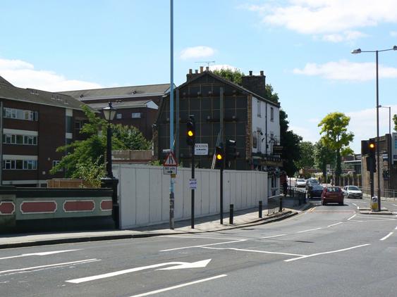 View of main road with a pub visible to the left