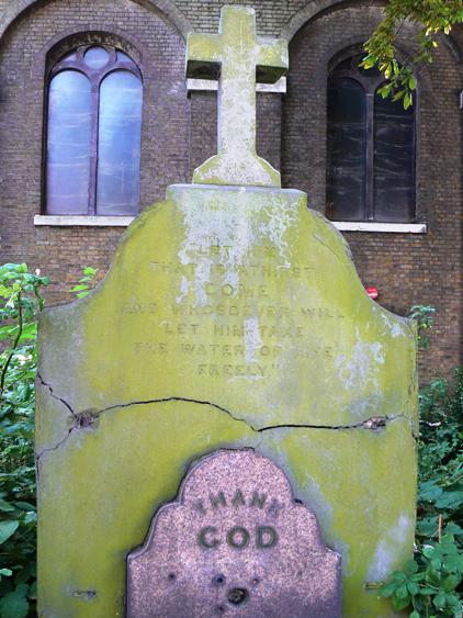 Stone surmounted by cross and incised 'Let him who that is at thirst come and whosoever will let him take the water of life freely'; a smaller stone backing on to it, simply incised 'Thank God'