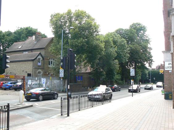 London brick buildings and tall trees