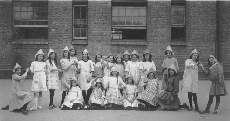 Group of 22 girls, in a school playground?