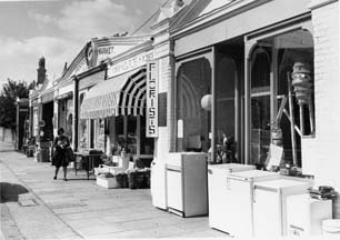 Single storey shop fronts, part of the original 1893 market building, photographed in 1976
; image provided by Chiswick Public Library