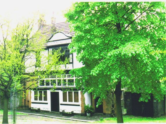 Elegant building with black and white-painted woodwork