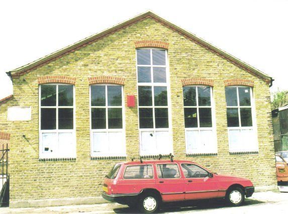 Brick building with 5 windows