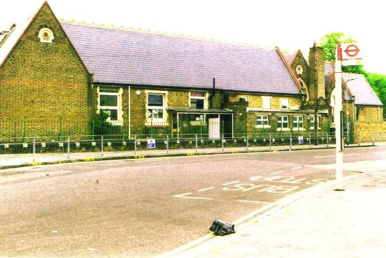 Slate roofed brick building