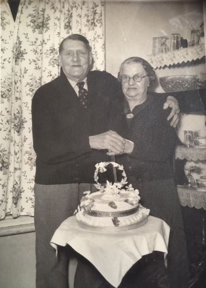 Cake cutting by Mr and Mrs Tripp, their golden wedding anniversary