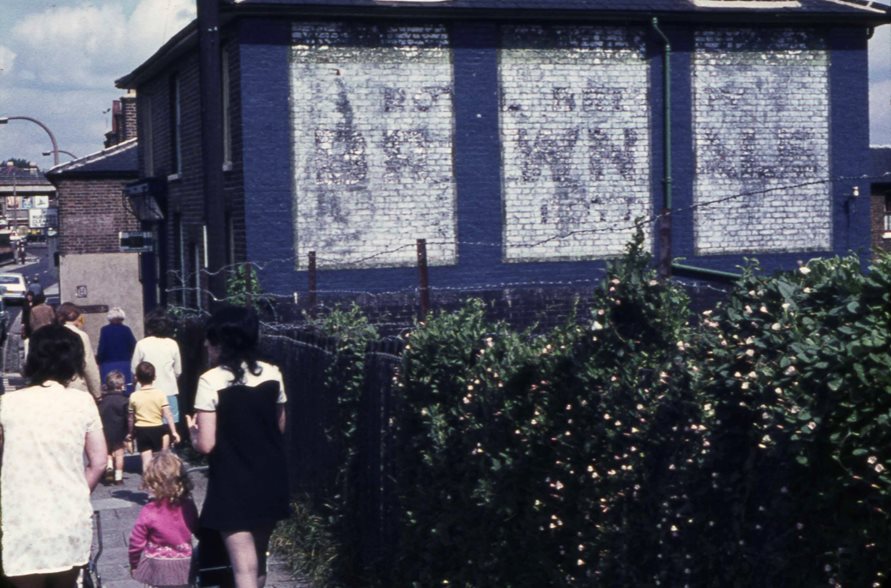 People walking along Windmill Road